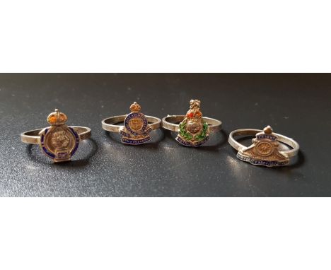 FOUR SILVER SWEETHEART RINGScomprising Royal Armoured Corps, Royal Artillery, Royal Marines and Royal Army Ordnance Corps (4)