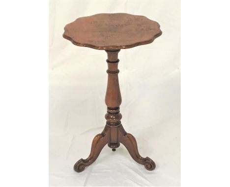 WALNUT TRIPOD WINE TABLEwith a burr wavy rim top on a turned column with three outswept supports, 70cm high 