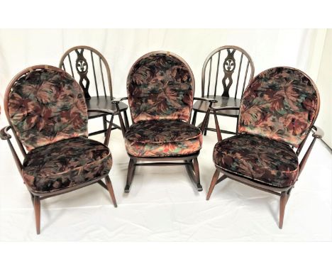 FIVE ERCOL CHAIRSeach with a hoop stick back with a central splat, standing on turned supports, comprising two dining chairs,