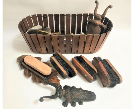 SELECTION OF SHOE CLEANING REQUISITESincluding nine various bristle brushes, two beetle boot jacks, various metal and wooden 