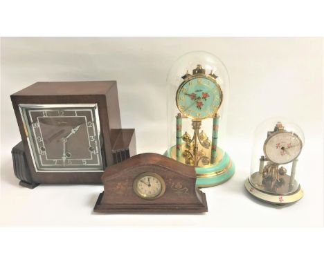 BENTIMA MAHOGANY CASED MANTLE CLOCKthe square dial with chrome Arabic numbers and a Westminster chime movement, a Haller 400 