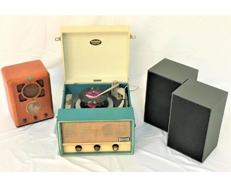 DANSETTE VINTAGE RECORD PLAYERthe lift up lid revealing a turntable, with a front mounted speaker above three control knobs, 