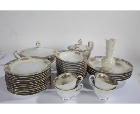 Large quantity of Noritake porcelain tea and dinner ware, all decorated with flowers on a cream and white ground, comprising,