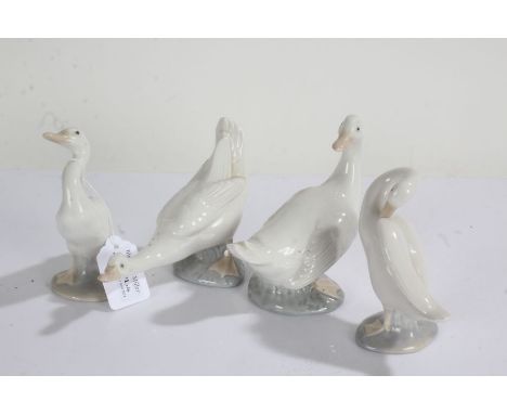 Two Lladro geese and two Nao geese, all modelled in various positions (4)