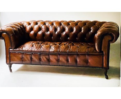 CHESTERFIELD SOFA, hand dyed leaf brown antique buttoned leather with deeply curved back and arms, 218cm L x 82cm H x 88cm D.