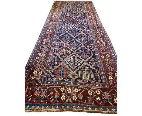 ANTIQUE NORTH WEST PERSIAN CARPET, 545cm x 200cm. 