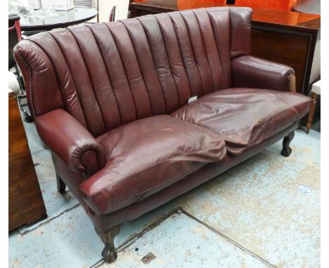 SOFA, 174cm L x 99cm H brown leather with a scalloped back. 