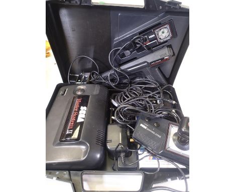 Sega Master System II, power base, control stick, light phaser, control pads, leads, transformer and Rainbow Islands game, in