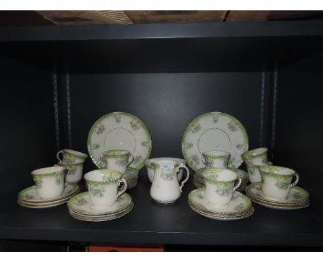A part tea service by Sutherland art china with moulded cups enamel detailing and gilt edge work
CONDITION REPORT Good condit