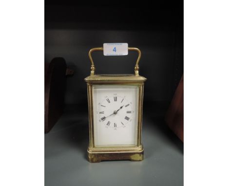 A brass cased carriage clock having stamp mark for Paris with internal chime