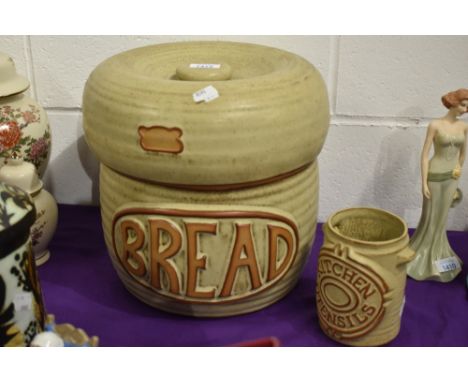 A mid century Tremar bread bin and utensil jar, inner bread bin lid having small chips to inner rim