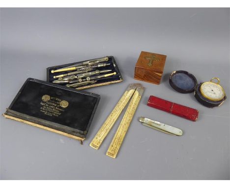 A Gentleman's Lot, comprising a silver topped ruler, J. Casartelli &amp; Son pocket barometer, mother or pearl and silver fru