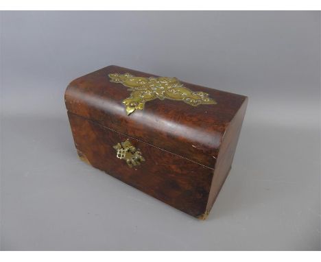 A George III Walnut Tea Caddy, with decorative brass fittings, the interior with two lidded tea compartments, approx 23 x 12 