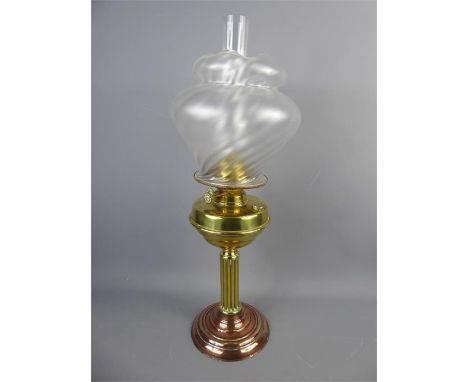 A Brass and Copper Opaque Glass Oil Lamp, with funnel intact, approx 63 cm.