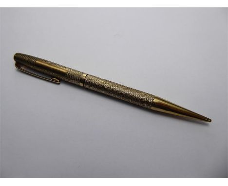 A Vintage 9ct Gold Yard O' Led Engine Turned Propelling Pencil, stamped 375, Birmingham hallmark, dated 1965, mm E. Baker &am