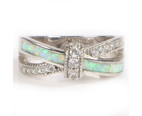 **VENDOR TO COLLECT, ITEM SOLD £200, BUYER HAS BEEN REFUNDED AS STONES NOT DIAMONDS 25/07/23 JA**&nbsp;
A diamond and opal cr