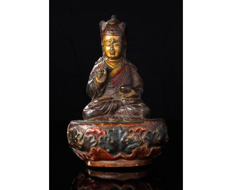 STATUETTE DE PADMASAMBHAVA EN BOIS SCULPTÉ POLYCHROMEBhoutan, XVIIIe siècleA POLYCHROME WOOD FIGURE OF PADMASAMBHAVABhutan, 1