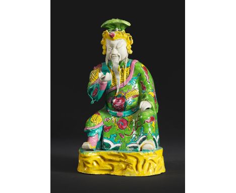 STATUETTE DE GUANYU EN PORCELAINE DE LA FAMILLE ROSEXVIIIe siècleA FAMILLE ROSE FIGURE OF GUANYU18th centuryThe bearded figur