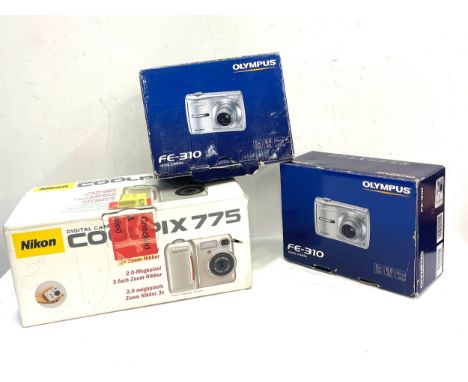 Two Olympus FE-310 Digital Cameras and a Coolpix 775 Nikon Camera 