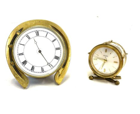 A brass horse shoe clock and a Swiza 8 clock largest measures 5.5 inches tall- Untested 