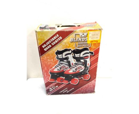 A set of Blindside adjustable roller skates in box 