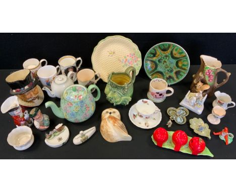 Decorative Ceramics - a Shelley Melody pattern teapot and cover;  Poole Delphis plate;'  German fairings;  Grotesque mug;   c