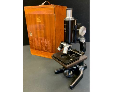 A Watson and Barnett, Service II model, monocular microscope, complete with x10 and x6 eye-pieces, in original wooden case. 