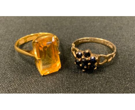 An oriental vibrant yellow citrine rectangular baguette cut dress ring, gold coloured metal shank, character symbol marks, si