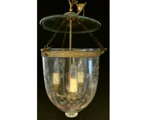 An Indian style Hundi lantern with engraved bowl, metal mounts and a three light fitment, 28cm diameter, 