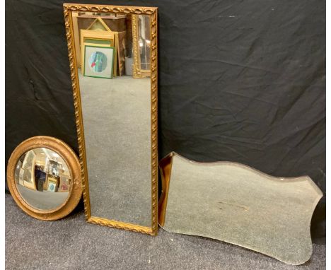 A Mid 20th century circular convex mirror, 29cm diameter; two other vintage mirrors, (3). 