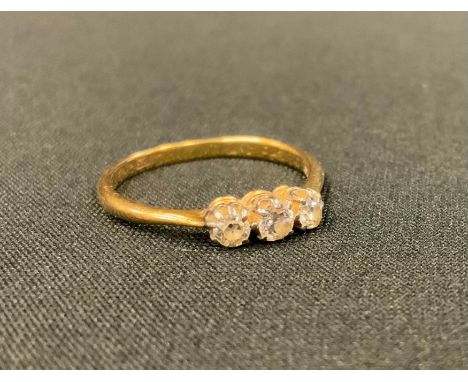 A diamond trilogy ring, linear set with three round old brilliant cut diamond total estimated diamond weight approx 0.20ct, 1