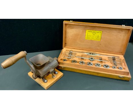 Vintage tools - A Burgess and Key of London mechanical grain processor, 19th century;  a Lehman, Archer, and Lane Ltd Tap and