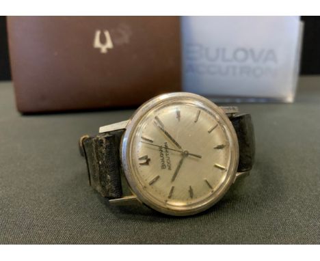 A Bulova Accutron stainless steel cased wristwatch, brushed silvered dial, arrow and block baton markers, centre seconds, bla