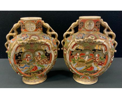 A pair of Japanese Satsuma moon flask vases, each decorated with figures within elaborate scroll and floral pattern, circular
