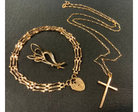 A 9ct gold gate bracelet, pad lock clasp;  9ct gold cross pendant necklace;  9ct gold brooch, 7g gross (3) 