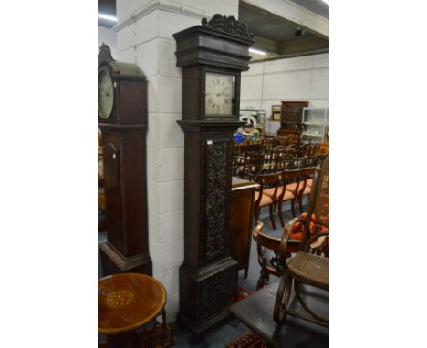 Joseph Wright Warwick, a 30 hour longcase clock with carved oak case.