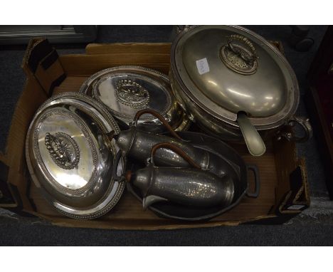 A large plated tureen cover and ladle, two entree dishes and covers and other items.