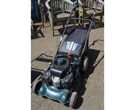A BMC petrol rotary lawn mower converted for electric start.