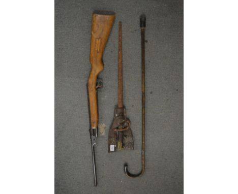 A bayonet with leather frog, a Webley Junior air rifle and a walking stick.