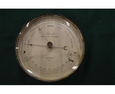 L Cassella, London, an aneroid barometer.
