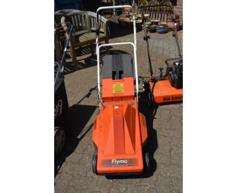 A Flymo electric rotary lawn mower.