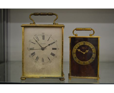 A Garrard quartz carriage clock and another carriage clock.