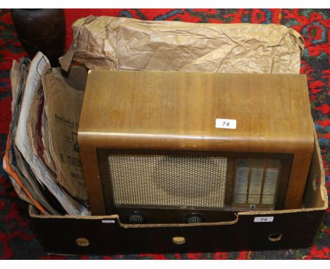 A walnut cased GEC three band wave valve radio, along with a small collection of 78 rpm records to include Brunswick, Columbi