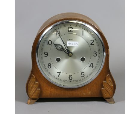 An early C20th oak mantel clock c1930.
