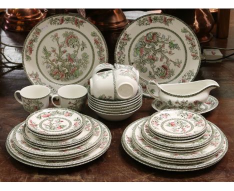 A Johnson Brothers Indian Tree pattern tea and dinner service including dinner plates, side plates, bowls, cups and saucers e