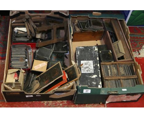 Two boxes of lantern slides to include Alice in Wonderland complete set, boxed, eastern scenes etc.