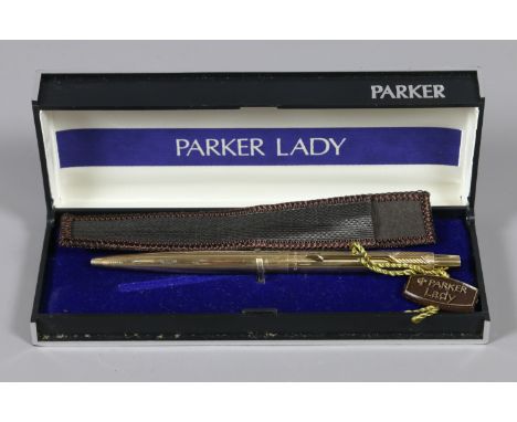 A Parker lady rolled gold ball pen in box with sleeve.