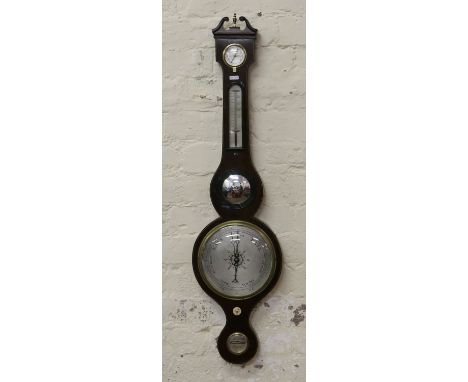 An early C19th inlaid mahogany cased banjo barometer.
