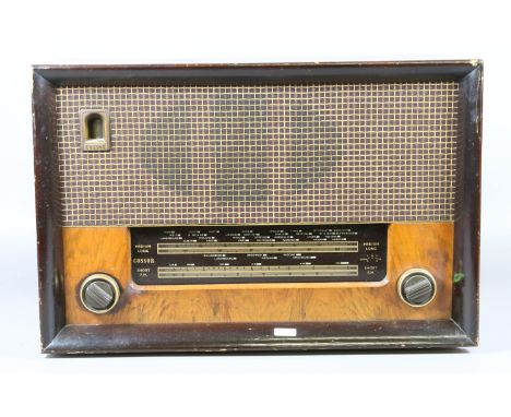 A walnut cased four wave band Cossor valve radio Melody Master model 523.