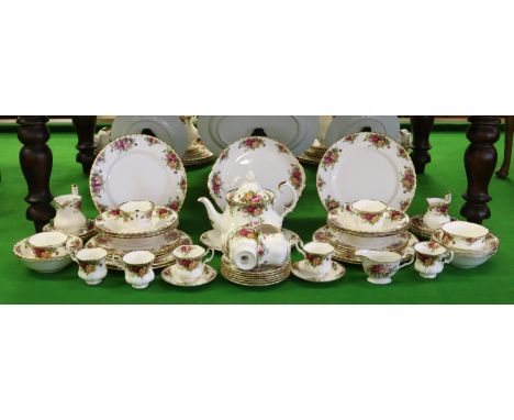 A Royal Albert tea set decorated in the old country roses pattern to include teapot, milk and cream jug, sugar basin etc appr